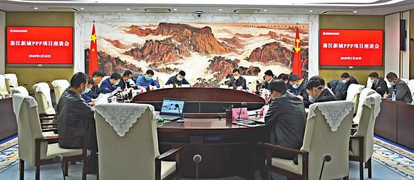 杨占文与中国水电十五局总经理王国强一行座谈